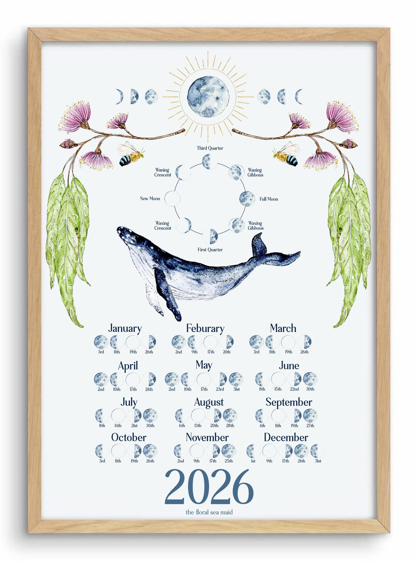 Framed artwork with a whale and moon phases for 2026, featuring a wooden frame. 2026 Lunar moon calendar