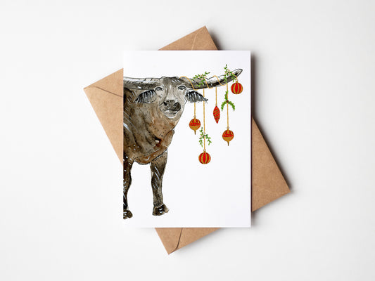 Christmas card with a buffalo and christmas baubles on a white Top End Christmas cards, Aussie Christmas cards, NT Christmas cards background