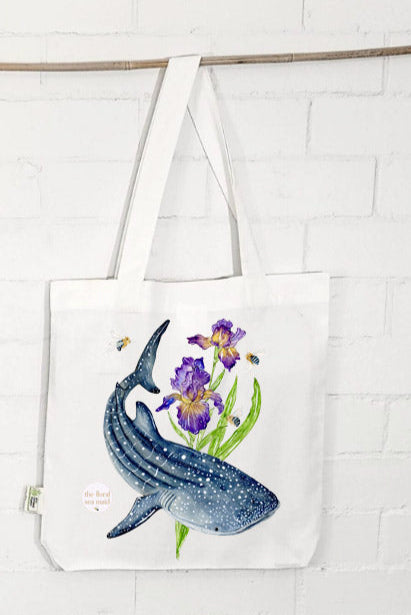 Tote bag with a whale shark and iris design on a white background